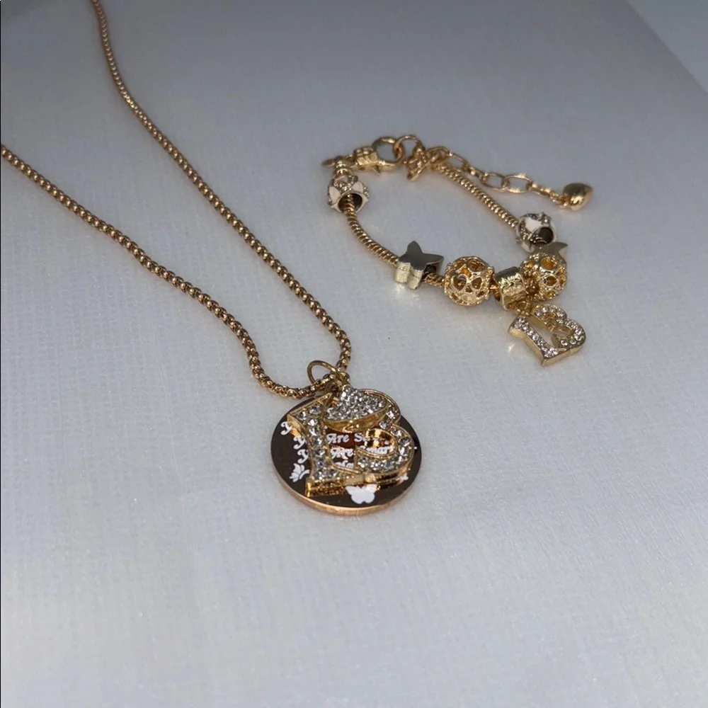 13 yr old girl jewelry gift set Gold NecklacePendant and charm bracelet NWT